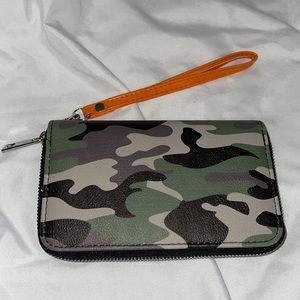 Camouflage wallet with a orange holder with silver hardware